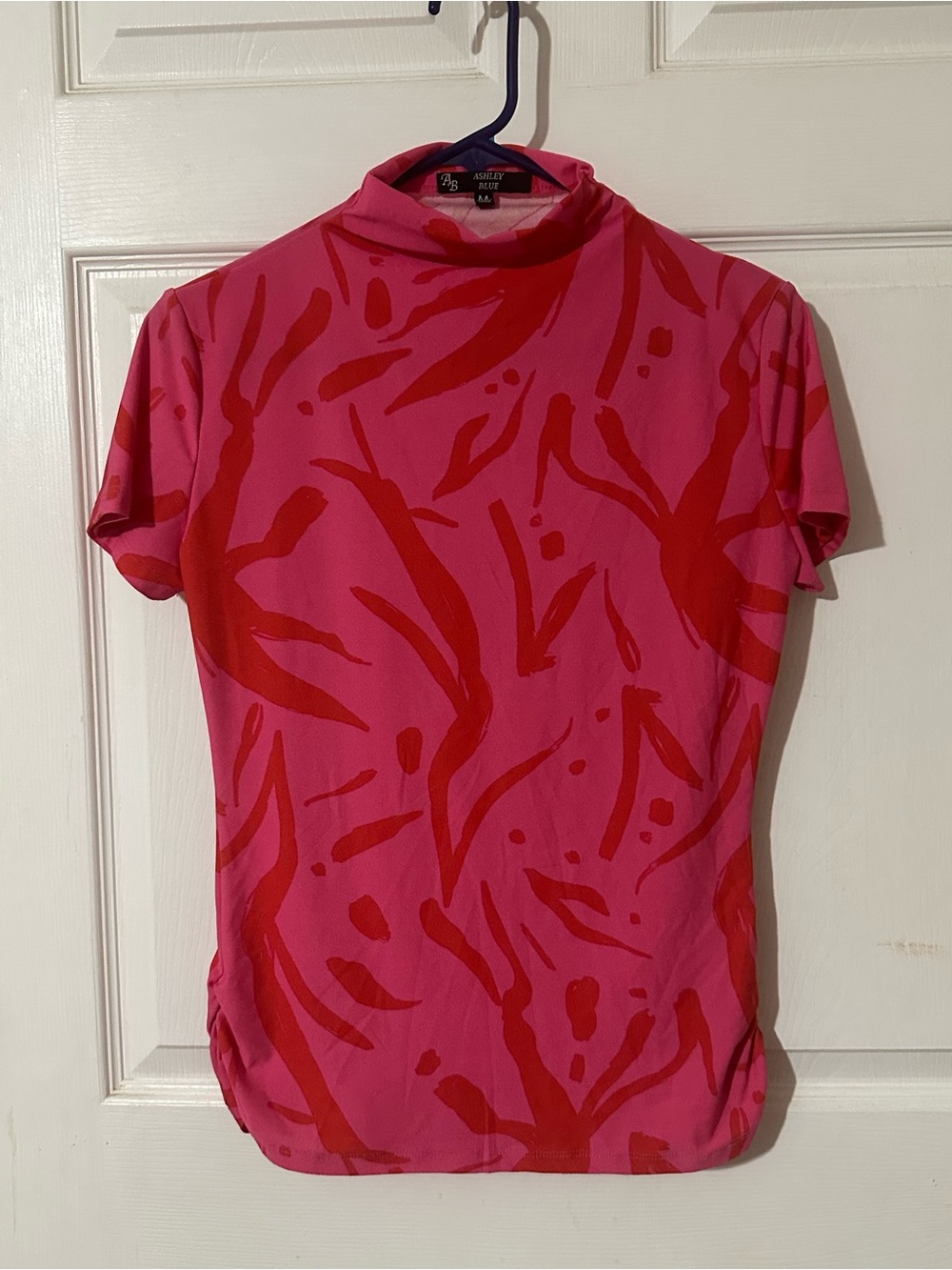 Ashley Blue Pink and Red Abstract Short Sleeve Mock Neck Top